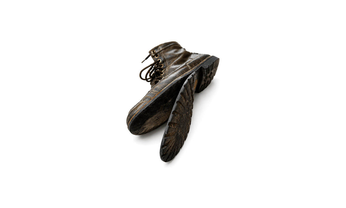 Scarpa danneggiata prima della riparazione