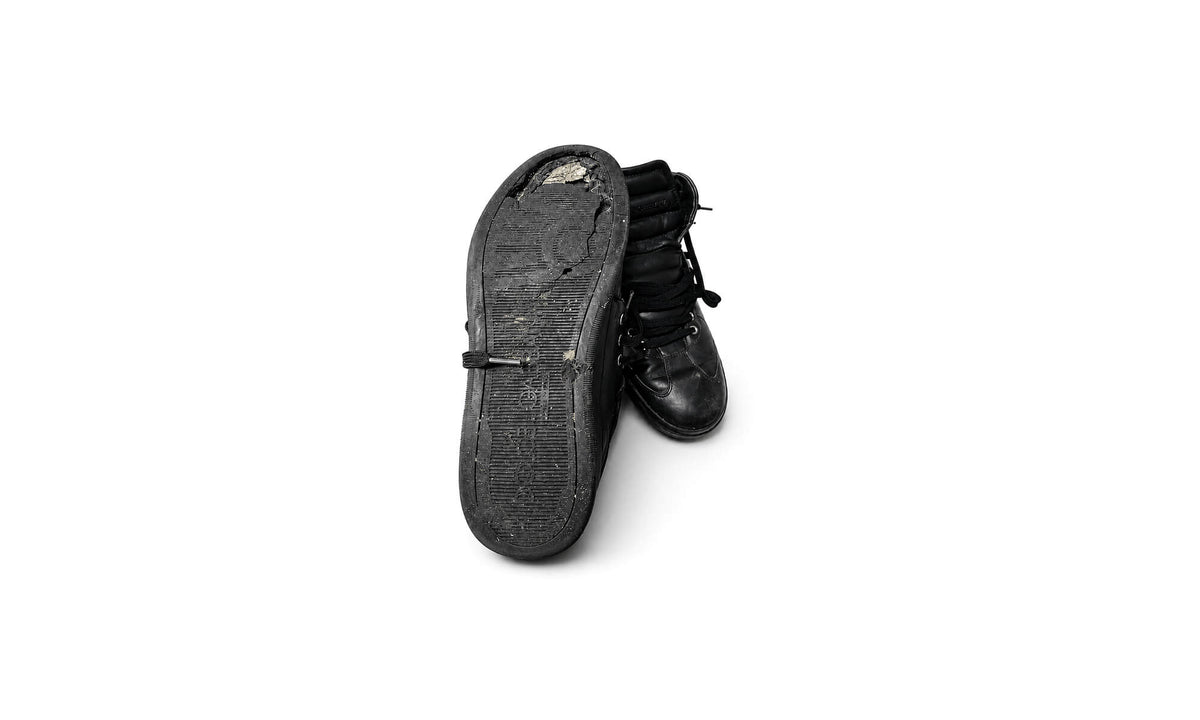 Scarpa danneggiata prima della riparazione